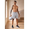 image:imageCOOFANDY Mens 2 Pack Workout Gym Shorts 7 Inch  5 Inch Athletic Shorts Lightweight Casual Jogger Short with Zipper PocketsKhaki  Grey