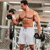 image:imageCOOFANDY Mens Athletic Shorts 7 Inch Quick Dry Stretch Lightweight Gym Workout Shorts with PocketsBlackno LiningWhite2 in 1