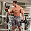 image:imageCOOFANDY Mens Athletic Shorts 7 Inch Quick Dry Stretch Lightweight Gym Workout Shorts with PocketsLeopardBlack
