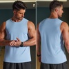 image:imageCOOFANDY Mens Workout Gym Tank Tops Quick Dry Muscle Sleeveless Shirts UPF 50 Running Summer Beach Athletic Swim ShirtLight Blue
