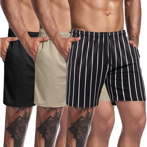 image:imageCOOFANDY Mens 3 Pack Workout Gym Shorts Mesh Athletic Shorts Lightweight Bodybuilding Training Short Pants with PocketsBlack  White StripeBlackKahki