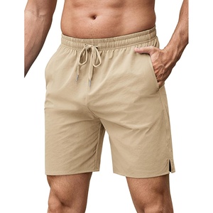image:imageCOOFANDY Mens Athletic Running Shorts 7 Quick Dry Lightweight Workout Gym Basketball Hiking Shorts with PocketsLight Khaki