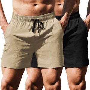 image:imageCOOFANDY Mens Running Athletic Shorts 5 Inch 2 Pack Gym Workout Shorts Fitted Exercise Hiking Shorts with Zipper PocketLight KhakiBlack