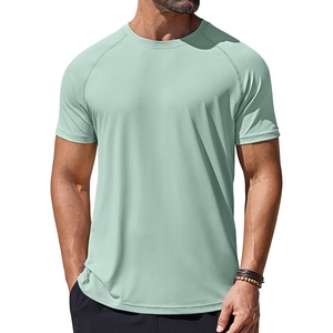 image:imageCOOFANDY Mens Swim Shirt UPF 50 Rash Guard Beach Tshirt Workout Quick Dry T Shirts for Running Surfing and HikingLight Green