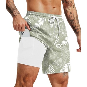 image:imageCOOFANDY Mens 7 Swim Trunks with Compression Liner Quick Dry 2 in 1 Bathing Suit Beach Swimwear Board Shorts with PocketsWhite Leaves