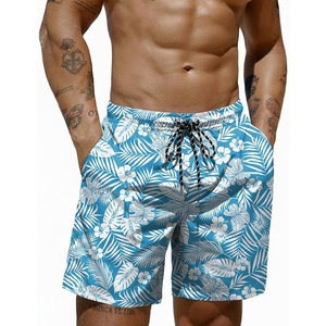 image:imageCOOFANDY Mens Swim Trunks 7 inch Bathing Suit with Mesh Liner Swim Shorts Board Short SwimsuitWhite Flowers Leaves on Blue