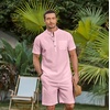 image:imageCOOFANDY Mens 2 Piece Cotton Linen Sets Summer Beach Outfits Casual Short Sleeve Henley Shirts and Vacation ShortsLight Pink