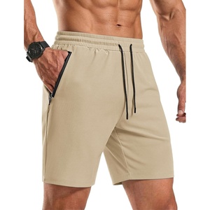 image:imageCOOFANDY Mens Gym Workout Shorts Quick Dry Athletic LooseFit Lightweight Running Shorts with Zipper PocketsBeige