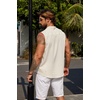 image:imageCOOFANDY Mens Sleeveless Summer Shirts Beach Tank Tops Button Up Textured Tank Shirt for VacationCream