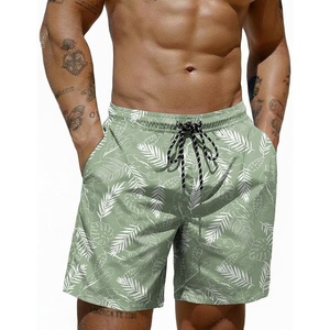 image:imageCOOFANDY Mens Swim Trunks 7 inch Bathing Suit with Mesh Liner Swim Shorts  Quick Dry Fabric Lightweight Stretch Material Breathable Mesh Brief Liner Swimming Summer Beach Vacation Mens SwimwearLight Green and White Leaves